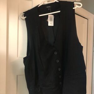 Black vest. New with tags